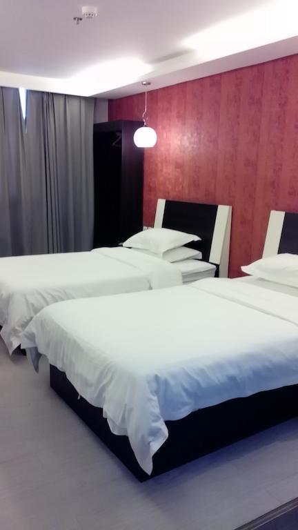 Fairyland Hotel Dongfeng Plaza Куньмин Номер фото